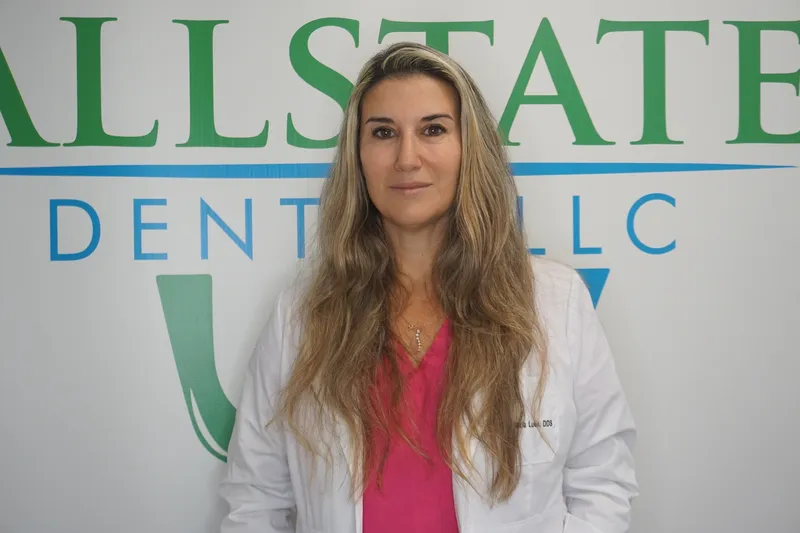 Dr. Maria Luba, DDS in her Newark dental office
